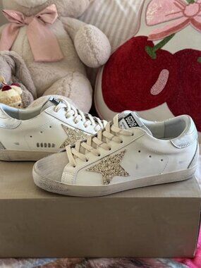 Golden Goose Women's White and Gold Trainers